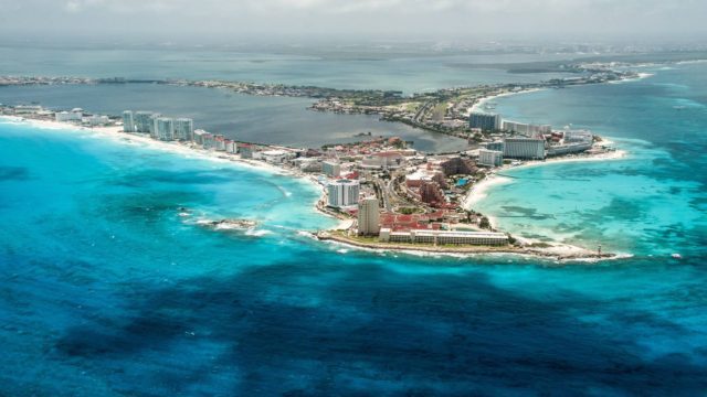 https://dev.travelonica.com/wp-content/uploads/2023/07/cancun-aerial-2022-11-09-10-40-37-utc-1-640x360.jpg