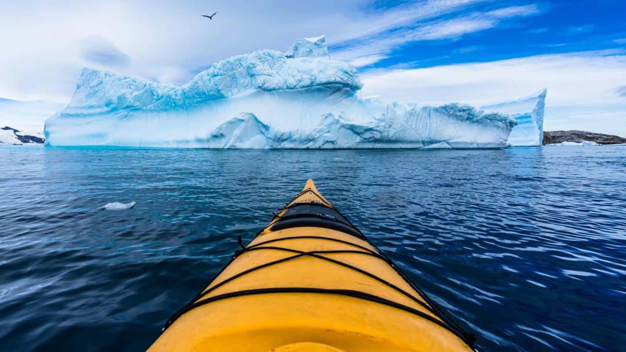 https://dev.travelonica.com/wp-content/uploads/2023/08/Iceberg-Kayak-1280x720.jpg