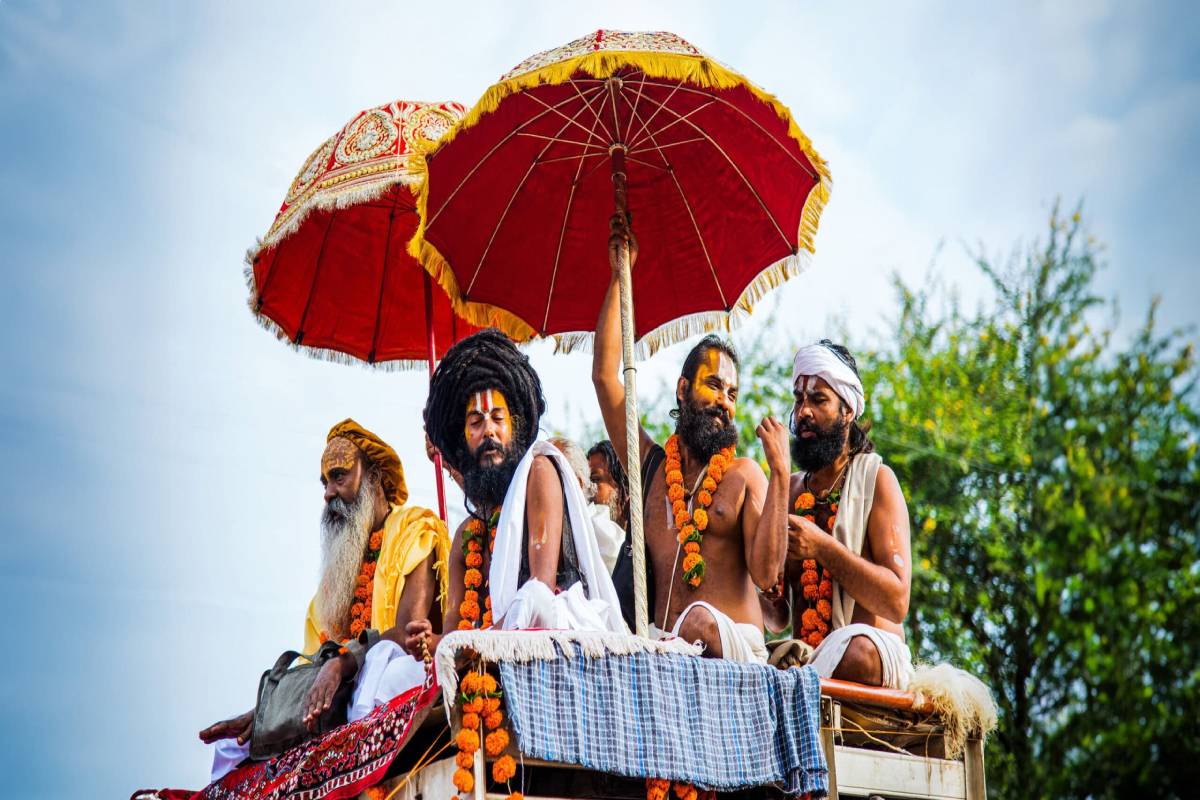 10-INDKUMBH-india-sadus-festival-men-umbrellas-scaled https://dev.travelonica.com/wp-content/uploads/2024/09/10-INDKUMBH-india-sadus-festival-men-umbrellas-scaled-1.jpg
