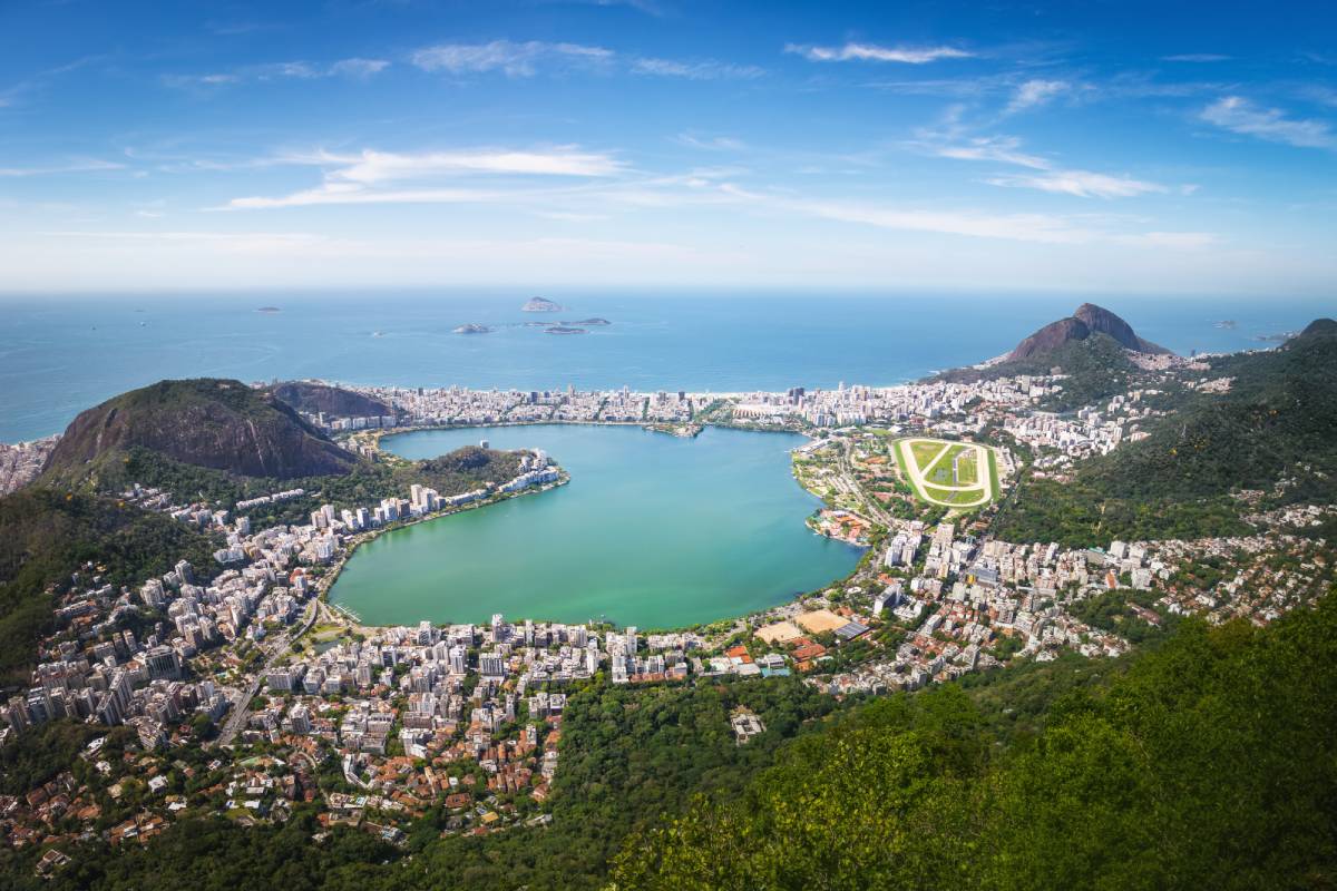 https://dev.travelonica.com/wp-content/uploads/2024/09/aerial-view-of-rodrigo-de-freitas-lagoon-and-two-b-2023-11-27-05-30-58-utc-1-1.jpg